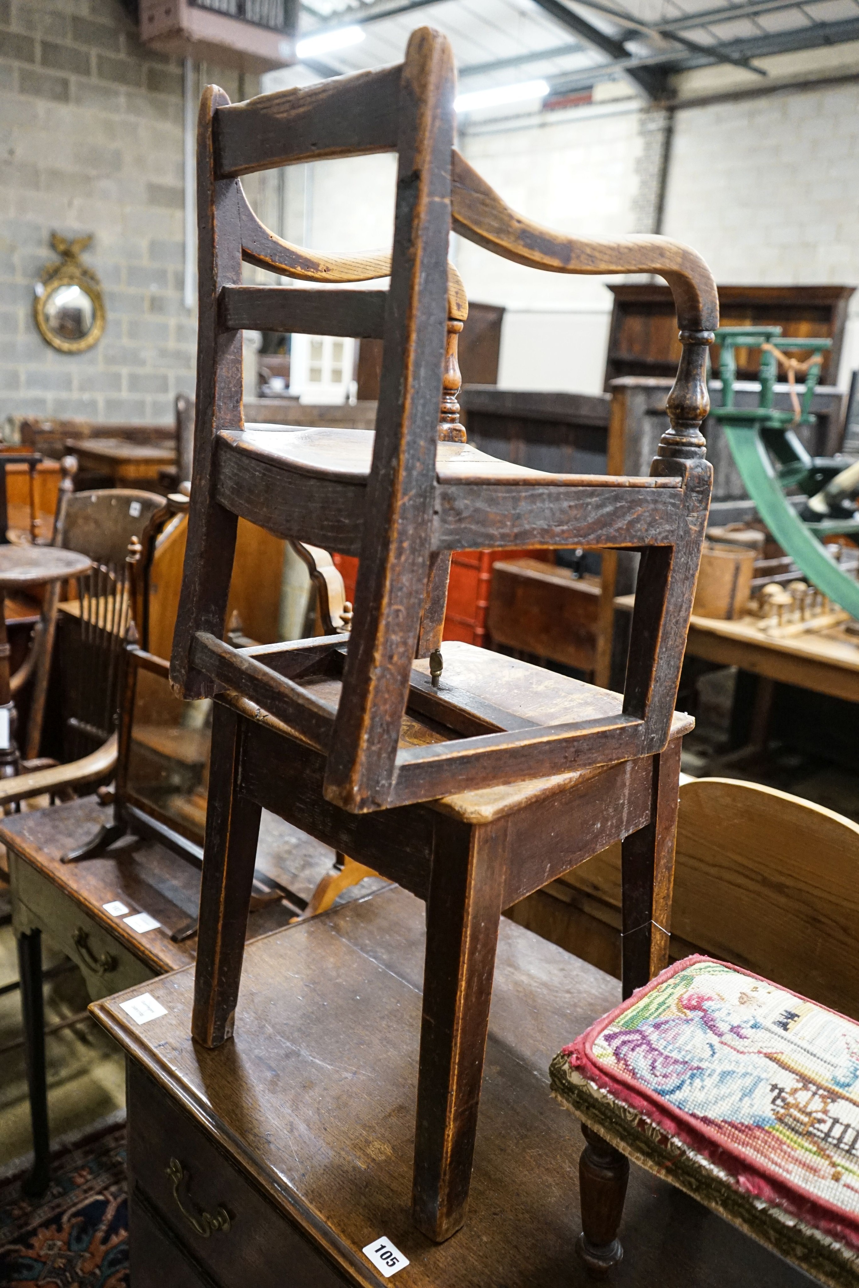 An early 19th century oak and elm child's chair, width 33cm, depth 32cm, height 83cm and a small Victorian mahogany stool with woolwork seat, width 27cm